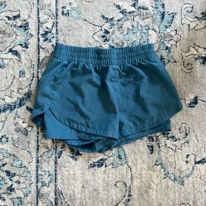 Blue athletic shorts.